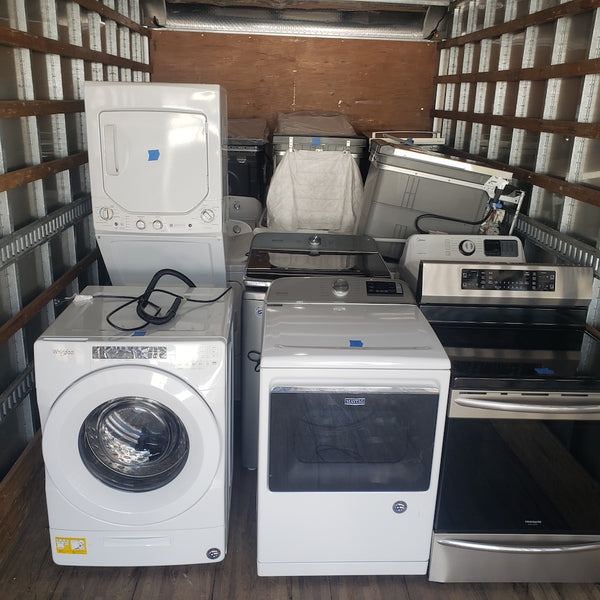 A truckload of scratch and dent appliances purchased by one of our appliance customers.