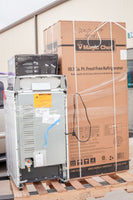 Magic Chef refrigerator on a pallet with its packaging in the background