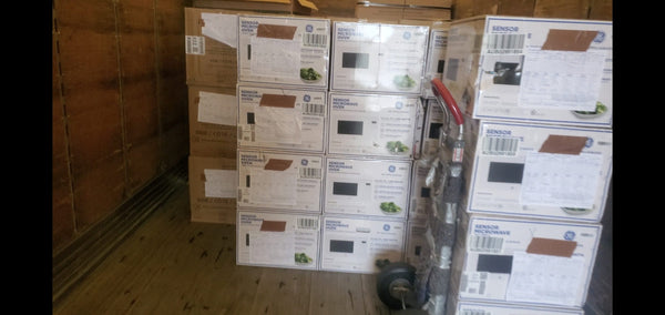Box Damaged Ge microwaves from our GE liquidation program.