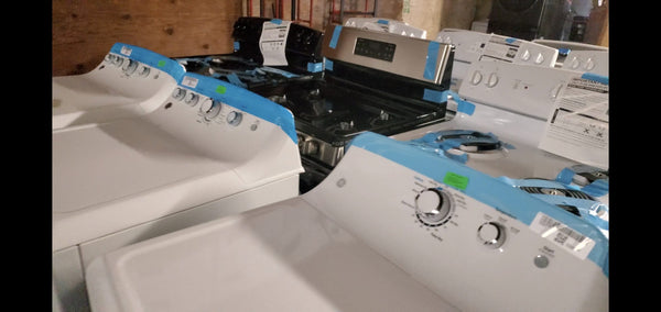 Pictured are some appliances from a truckload from our Demanufacture appliance program.