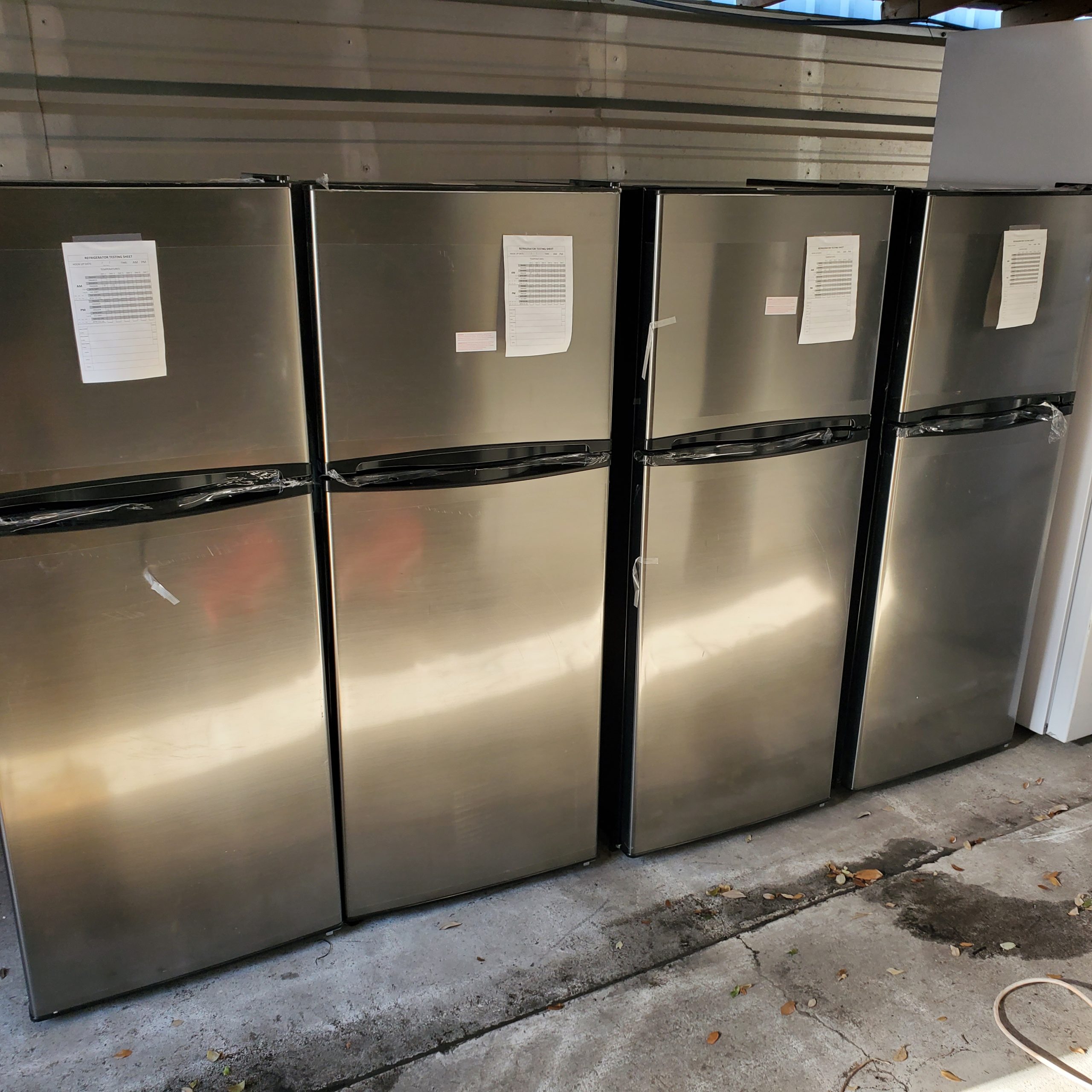 example pictures of Whirlpool stainless steel refrigerators from our wholesale liquidation program.