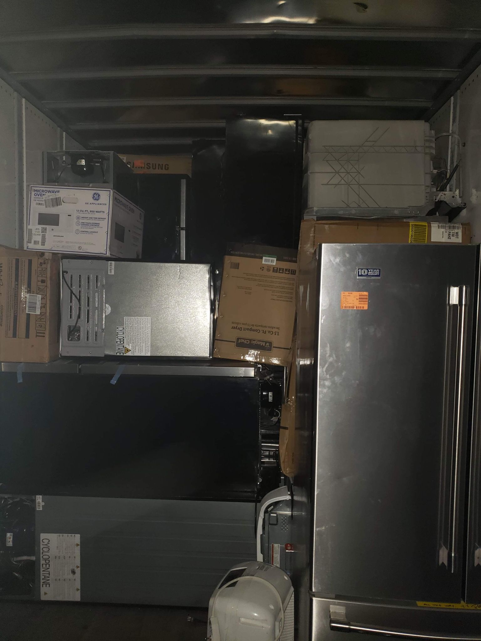 Picture of some Truckloads of Home Depot customer return appliances are available for sale now.