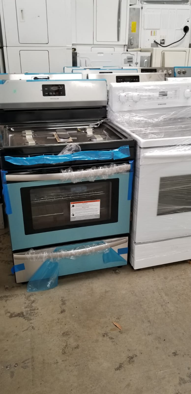 example of Liquidation scratch and dent Frigidaire Gas and Electric Ranges by the truckload.